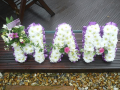 An image of  a floral tribute 37