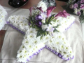 An image of  a floral tribute 45